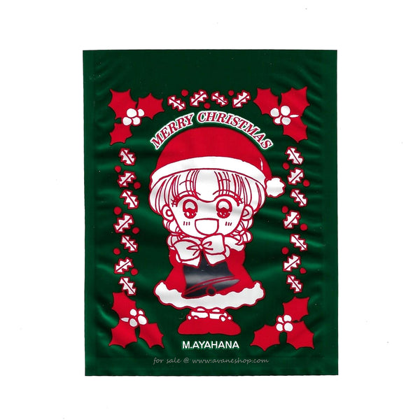 A green foil bag with red christmas decorations and an anime girl from Akazukin ChaCha. Art done by Manga creator min Ayahana, this bag was a furoku item given away with Ribon manga magazine in the 90s.