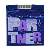 Blue plastic bag with white sparkles featuring art of two Anime style Manga characters from the Manga Partner drawn by Miho Obana.