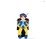 hand Painted anime cel of Prince Eccentro from MonColle Knights. This is a cel of anime man wearing a blue and yellow suit with epaulettes and a blue hat with a feather in it, he is holding up his hands in fists and making an angry face.
