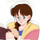 Han Painted anime cel from Sailor Moon. This is Yumemi Yumeno from episode 28, a girl with long brown braided hair, pale skin and glasses. She is wearing a pink and yellow jacket over a blue and white striped shirt. She is holding on to Mamarou's arm.