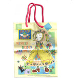 Yellow paper gift bag with anime manga style images of Ikako from Neighborhood story drawn by Ai Yazawa.