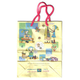 Yellow paper gift bag with anime manga style images of Ikako from Neighborhood story drawn by Ai Yazawa.