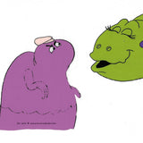 Animation cel froom the 80s pac man cartoon AKA Hanna Barbera's Pac-Man. This is the ghost Pinky disguised as a purple dinosaur about to be kissed by a green dinosaur.